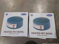 Two boxed blue 2.2 L Heated Pet Bowl units