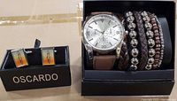Watch, bracelet set and boxed cufflinks overview