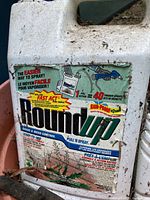 Front label of partial Roundup Grass & Weed Control jug
