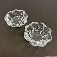 Top view of both clear crystal bowls showing scalloped edges