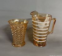 Pitcher and vase side by side, full front views