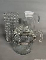 Three glass items grouped: bubble vase, Pyrex percolator, ribbed pitcher