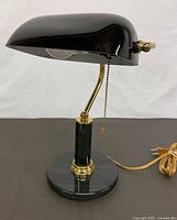 Full left-side view of lamp showing shade, marble base, pull chain and cord