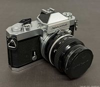 Three-quarter left view of Nikon Nikkormat FT2 with lens attached