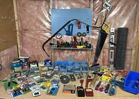 Overall view of workbench with hand tools on pegboard and large quantity of packaged hardware and fasteners