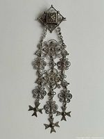 Full view of 830 silver Norwegian bridal brooch showing overall shape and filigree detail