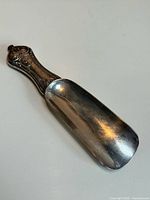 Full view of sterling silver shoe horn front