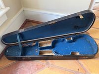 Case open showing blue interior and compartment layout