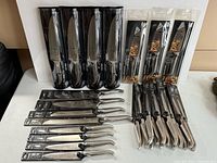 Multiple NIB Füri Pro knives in packaging, grouped by type