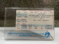 Front view of ticket inside acrylic commemorative case