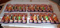 All 26 sealed Halloween Pez dispensers arranged on table