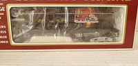 Front window of sealed box showing K-Line O/O27 gauge tank car