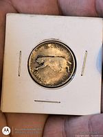 Reverse showing bobcat design and denomination