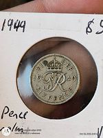 Reverse side of 1949 sixpence in holder