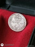 Reverse side showing crowned 3 and date