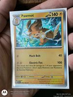Front of Pawmot holographic Pokémon card