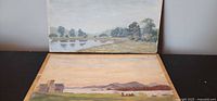 Both landscape paintings side by side showing size and condition