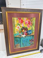 Front view of framed oil painting