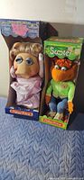 Both Fisher-Price Muppet dolls in boxes side by side