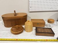 Group shot of all six wood items with measuring tape for scale