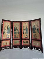Full view of four-panel folding screen standing open