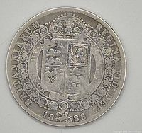 Reverse of 1888 Queen Victoria half crown showing shield design and date