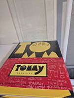 Front cover of hardcover book showing title graphics