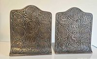 Front view of both bronze Zodiac bookends