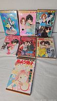 Front view of all seven manga volumes