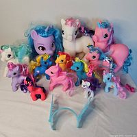 Group shot of all pony figures and accessory