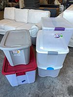 Group of five storage totes stacked together