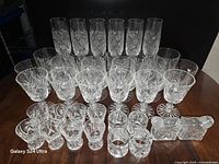 Entire 38-piece crystal set arranged on table