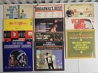 All eleven LP records laid out showing front jackets