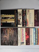 Twelve LPs laid flat showing front jackets