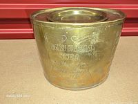 Front view showing embossed English Breakfast Tea wording and lid