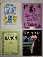 Front covers of all four music books