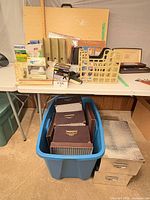Overall view showing drafting board, organizers, storage boxes and tote