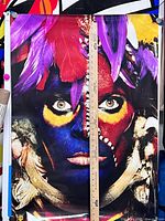 Full view of poster with ruler showing scale