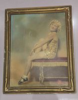 Full view of framed hand-colored photograph