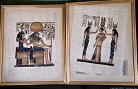 Both framed papyrus paintings side by side