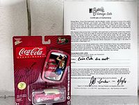 Sealed Johnny Lightning Coca-Cola package with car, tray and COA visible