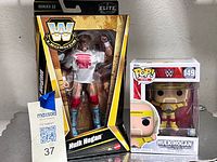 Front view of both boxed items showing seals and graphics