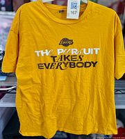 Front of yellow Lakers T-shirt showing logo and slogan graphic