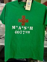 Front view of green M*A*S*H t-shirt showing full graphic