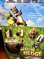 Full view of poster showing main characters with net and fishing rod, text and title visible