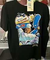Front of black Simpsons graphic T-shirt showing full design and size of garment