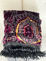 Scarf folded showing overall pattern and fringe