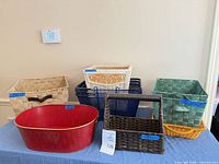 All seven baskets and organizers arranged on table