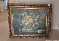 Front view of framed floral oil painting