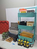 Overall view of cart, radios, bins, accessories